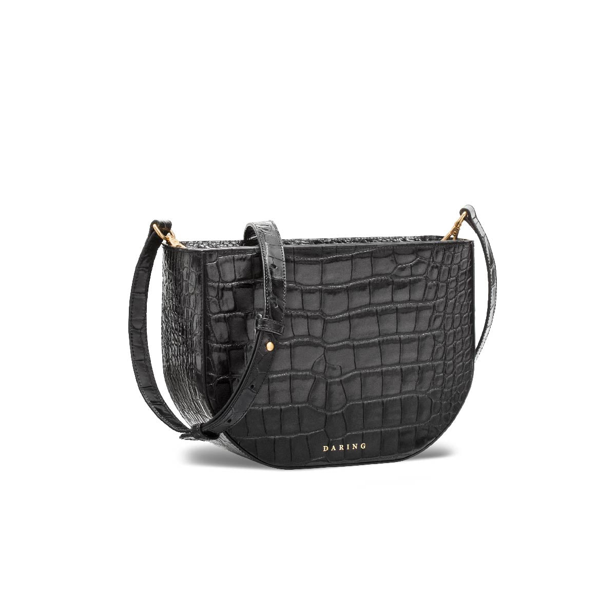 The Crossbody Bag in Black, with adjustable strap, three quarter view.